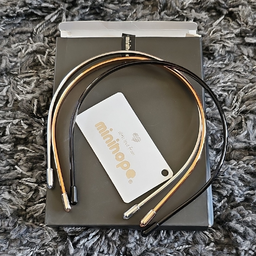 Sleek Black and Gold Wireless Headphones with Neckband Design